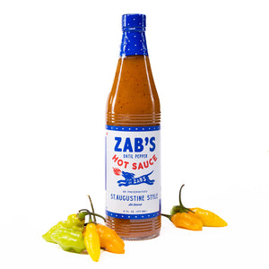 Bottle of Zab's St. Augustine Style with fresh Datil Peppers